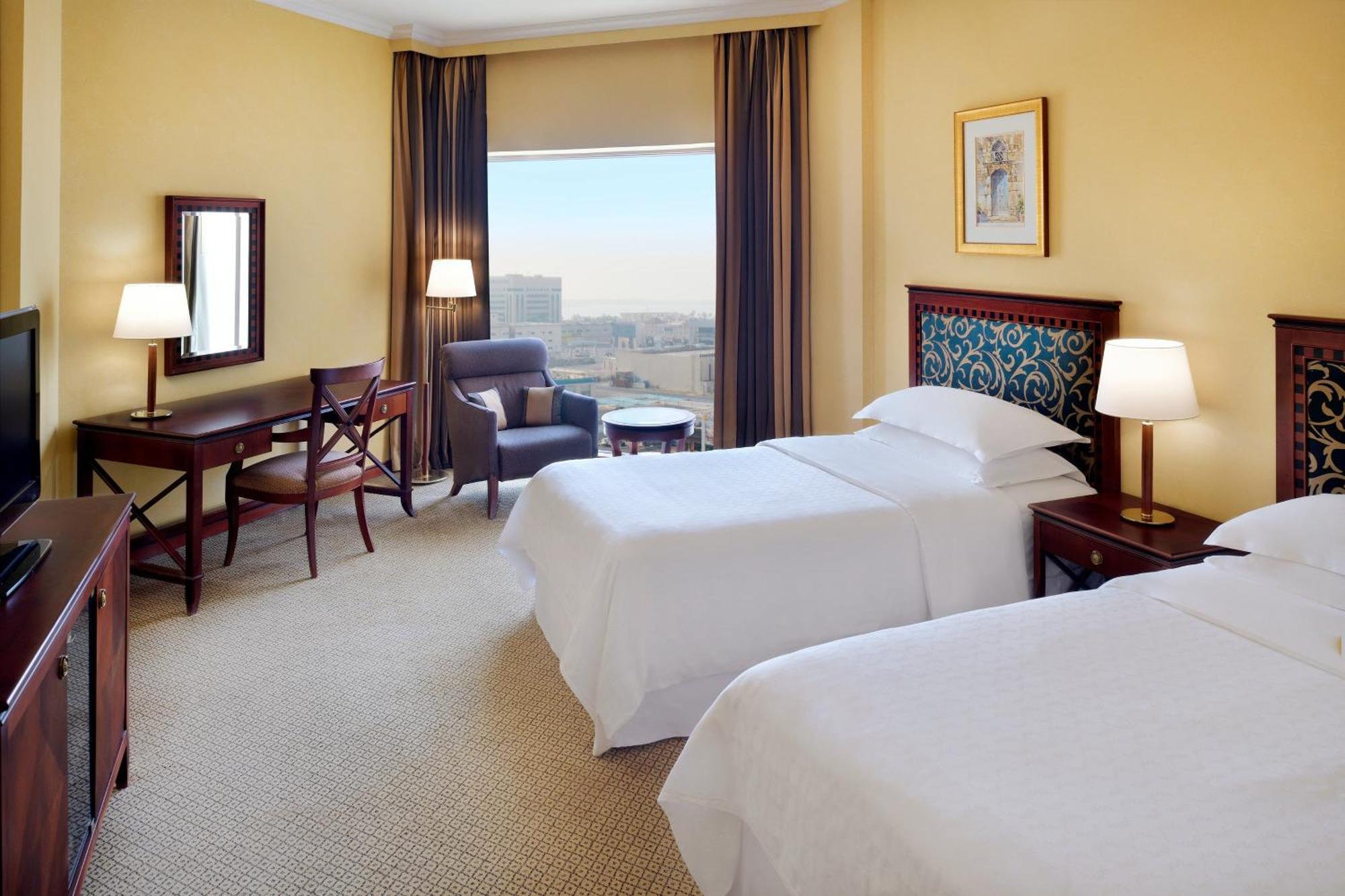 Sheraton Dammam Hotel & Convention Centre Exterior foto A guest room at the Sheraton Riyadh Hotel